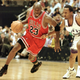 Michael Jordan of the Chicago Bulls goes to the basket past Shandon Anderson of the Utah Jazz during Game 6 of the NBA Finals in Salt Lake City, UT.